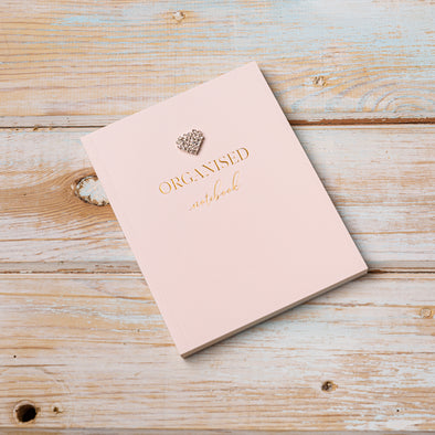 Gorgeous soft pink outer cover with gold leaf writing
