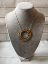 Triple circle matt gold plated necklace