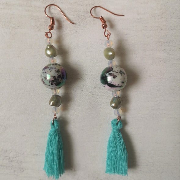 Turquoise tassel earrings view from above