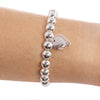 Silver Ball Bracelet with Double Rose Gold and Silver Heart Charm on writst